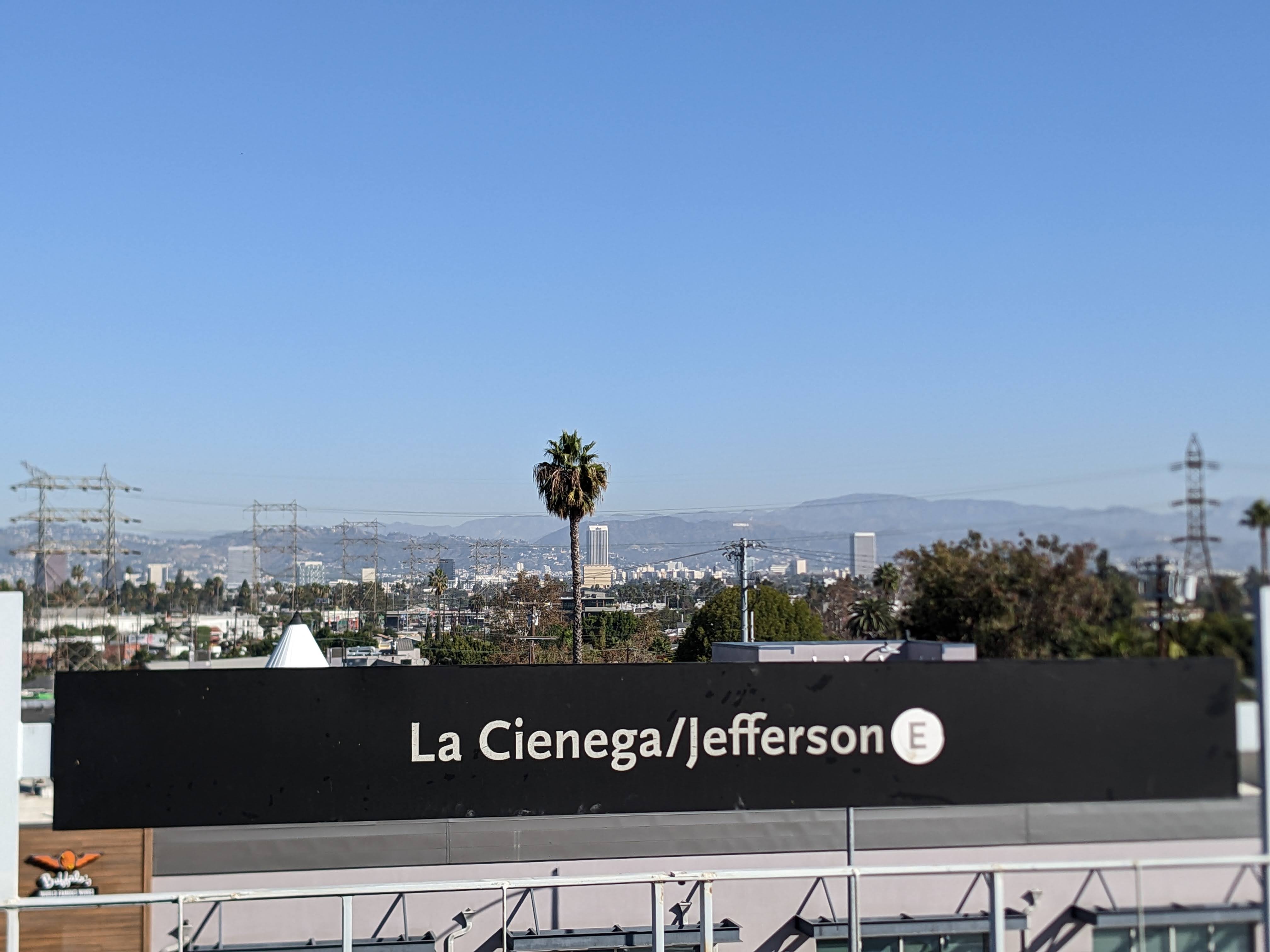 The HOLLYWOOD sign, visible in the distance